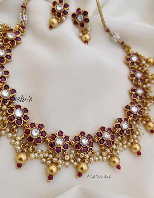 Flower Design Kemp and White Stone Necklace